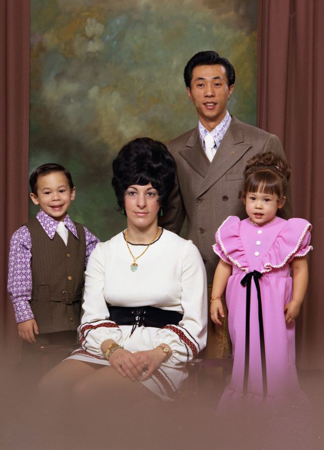 #15 Family portrait of the Jay family. Tim Jay is standing at the back of the arrangement. Patricia is seated and is flanked by her two children, February 15, 1972