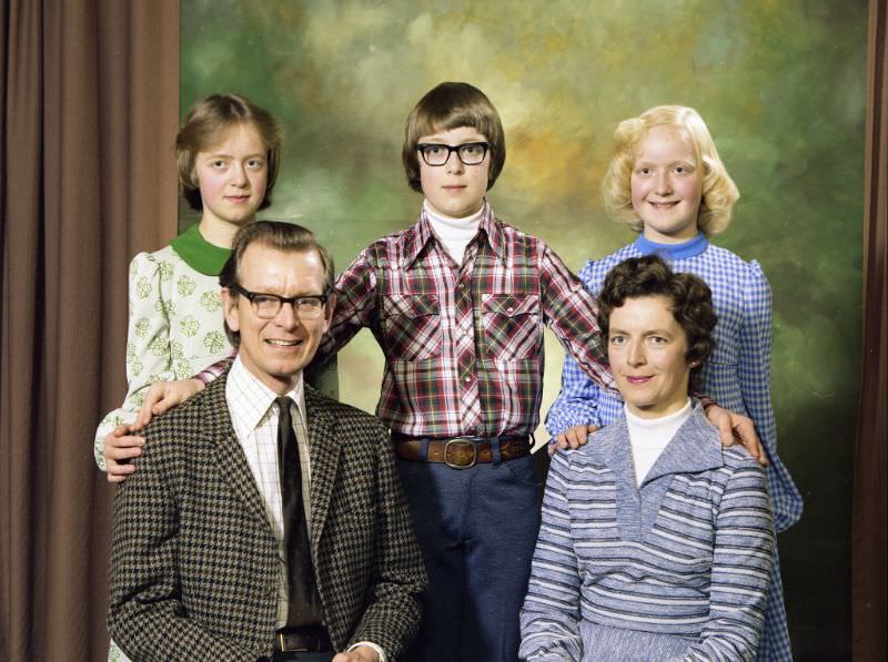 #29 Family portrait of John Kirkhope and his family. The children, comprised of two girls and one boy, are standing behind their parents, February 25, 1978