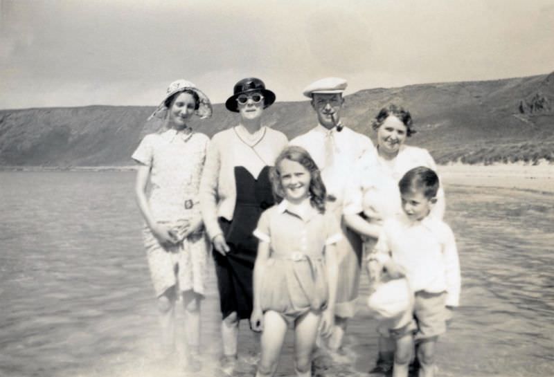 #12 Six members of a British middle-class family posing at the seaside, 1935