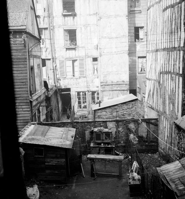 #35 Courtyard between buildings in the eastern district, Rouen, September 1951