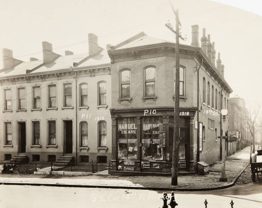#37 Buildings on the southeast corner of 14th and Hickory streets in 1920, featuring the Hickory Confectionary at 1318 Hickory.