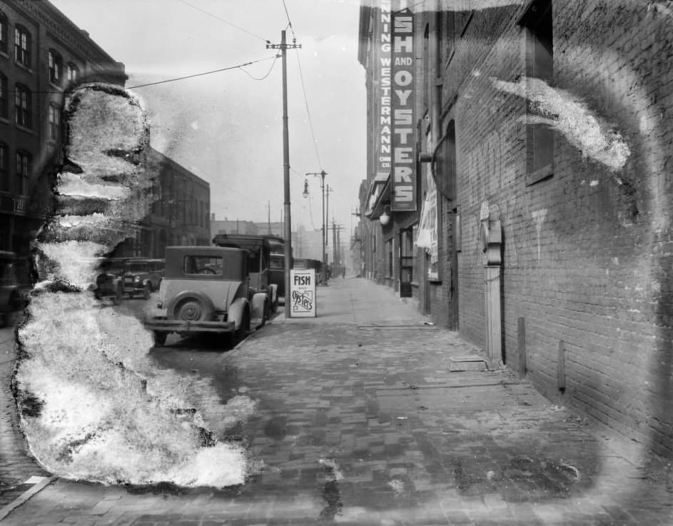 #177 View of the 900 block of North 6th Street, with businesses such as the Brunswick-Balke-Collender Company, Leo B. Bruno’s Fish and Oysters, and Krenning-Westermann China Company visible, 1925