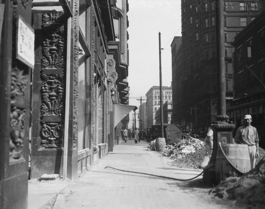 #187 View from the west sidewalk on 8th St. looking north towards Pine St., with the Arcade building visible, 1925