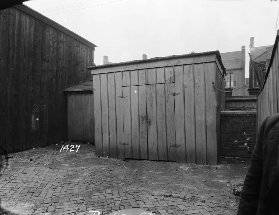 #204 View of woodshed and cobblestones at 1427 Dodier Street, 1927