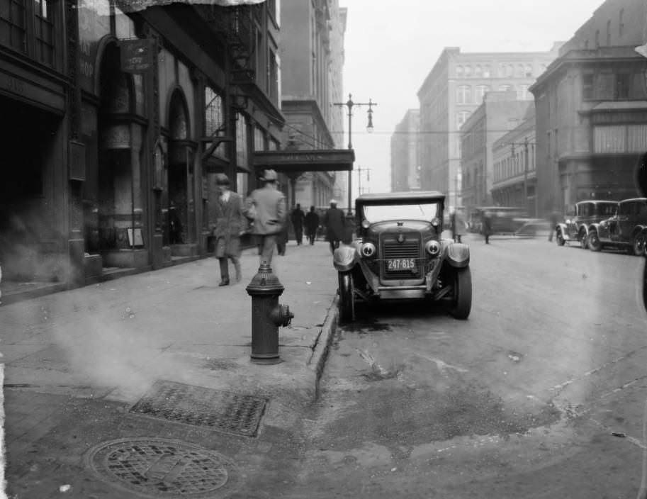 #74 View looking north down North 10th Street towards Locust Street. Bolland’s Jewelry Store was located at 325 North 10th Street, and the Kinloch Building was behind it at the NW corner of North 10th Street & Locust Street, 1927