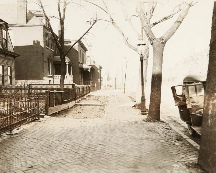 #3 Cobblestone sidewalk and houses along North Grand, near its intersection with Lee Avenue, 1920