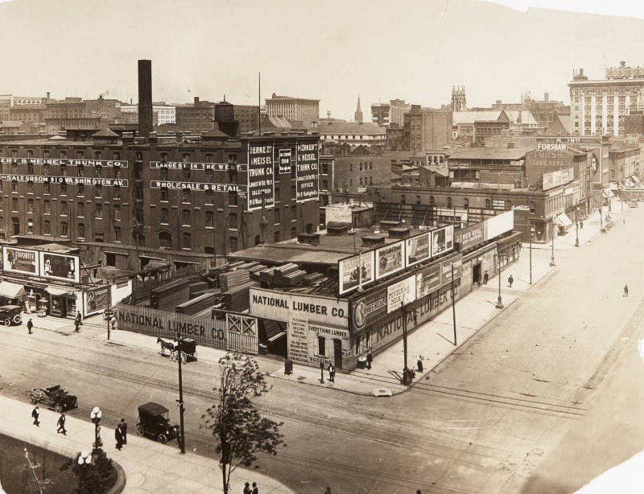 #101 The northwest corner of 12th and Market Streets with National Lumber Co., Herkert & Meisel Trunk Co., and Forshaw Stove Repairs buildings, 1920