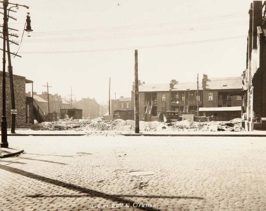 #111 Rear of buildings and an empty lot at the interestion of Twentieth and O’Fallon streets, 1920