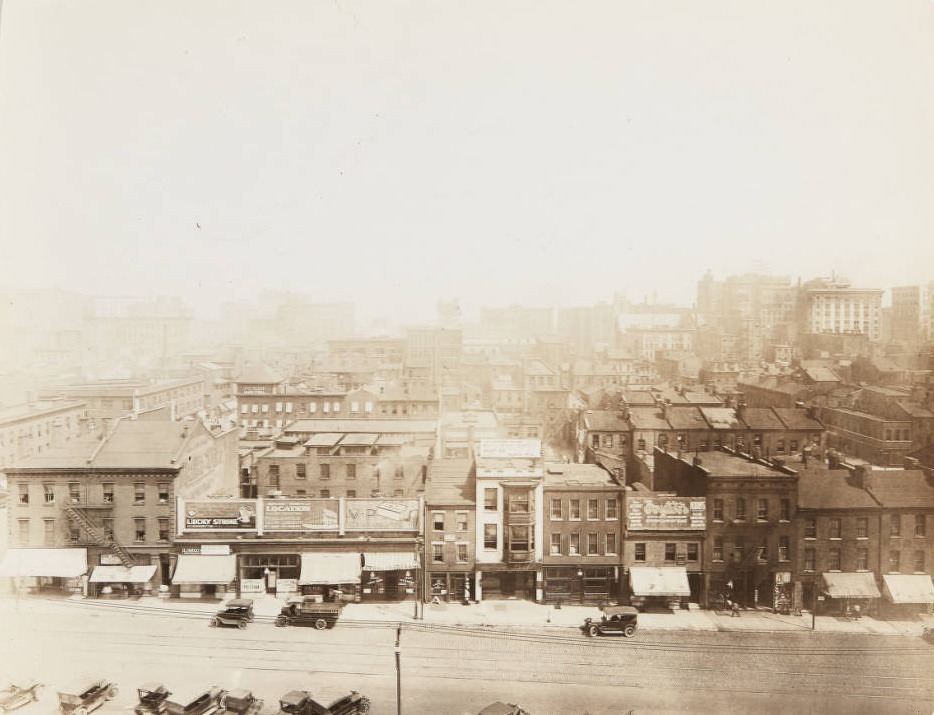 #121 1300 block of Market Street in 1920, with a row of buildings between 13th and 14th streets.