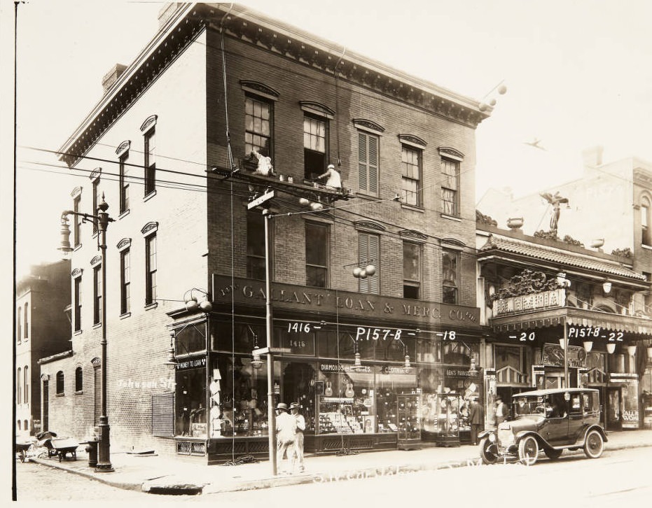 #126 Southwest corner of the intersection of Johnson and Market in 1920, with the Gallant Loan and Mercantile Co. at 1416 Market and the Olympia Theatre next door at 1420 Market.