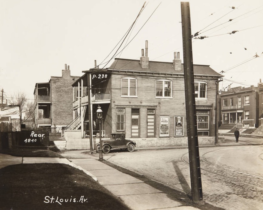 #30 Building at 4840 St. Louis Avenue in 1920. The first floor window displays a sign for Schaeffer Grocer.