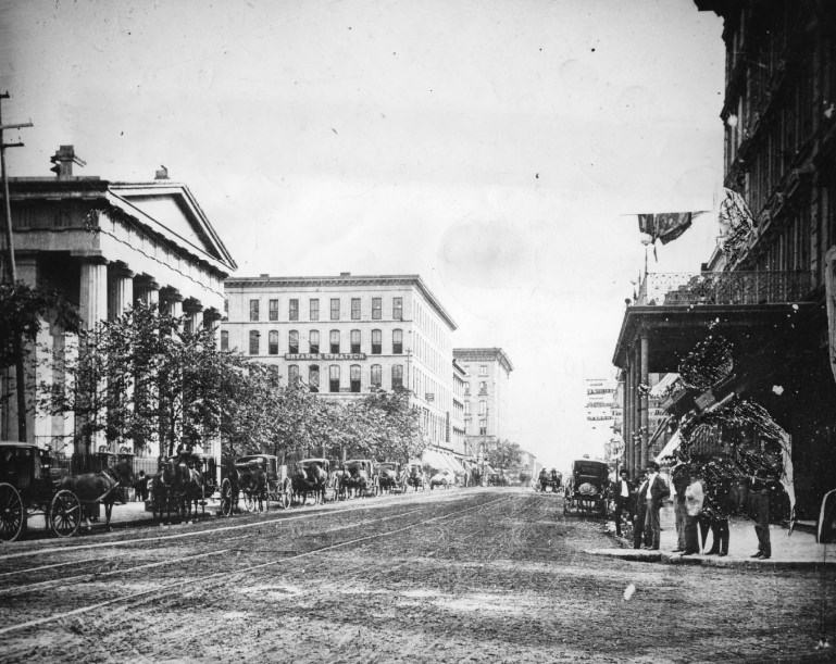 #141 Broadway looking south from Chestnut. Showing court house, Bryant and Stratton Business College and Southern Hotel on left side of plate, 1949