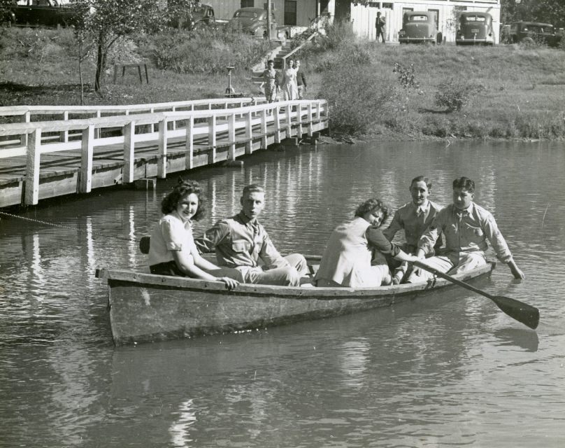 #167 Hostesses rowing a boat, date unknown.