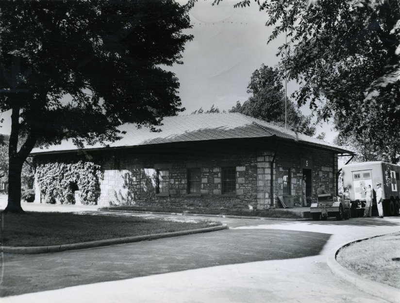 #65 The guard house, built in 1830, is still in use today. Soldiers at door are part of a training detachtment stationed at post.