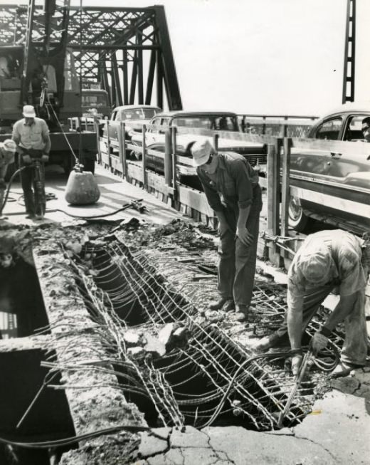 #108 MacArthur Bridge workmen break up old pavement in preparation for resurfacing the span, 1985