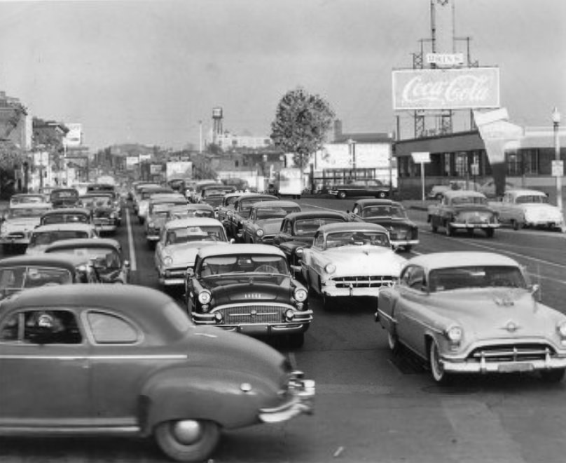 #212 Street Scene, looking east on Market street from Theresa street about 5 p. m., 1955