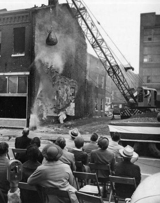 #34 Plaza Apartments – Mayor Tucker swings the wrecking ball, 1955