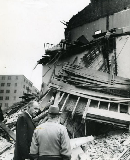 #109 William Trantina, acting Director of Public Safety, at the scene of the collapsed building, 1209 Chouteau ave., 1960