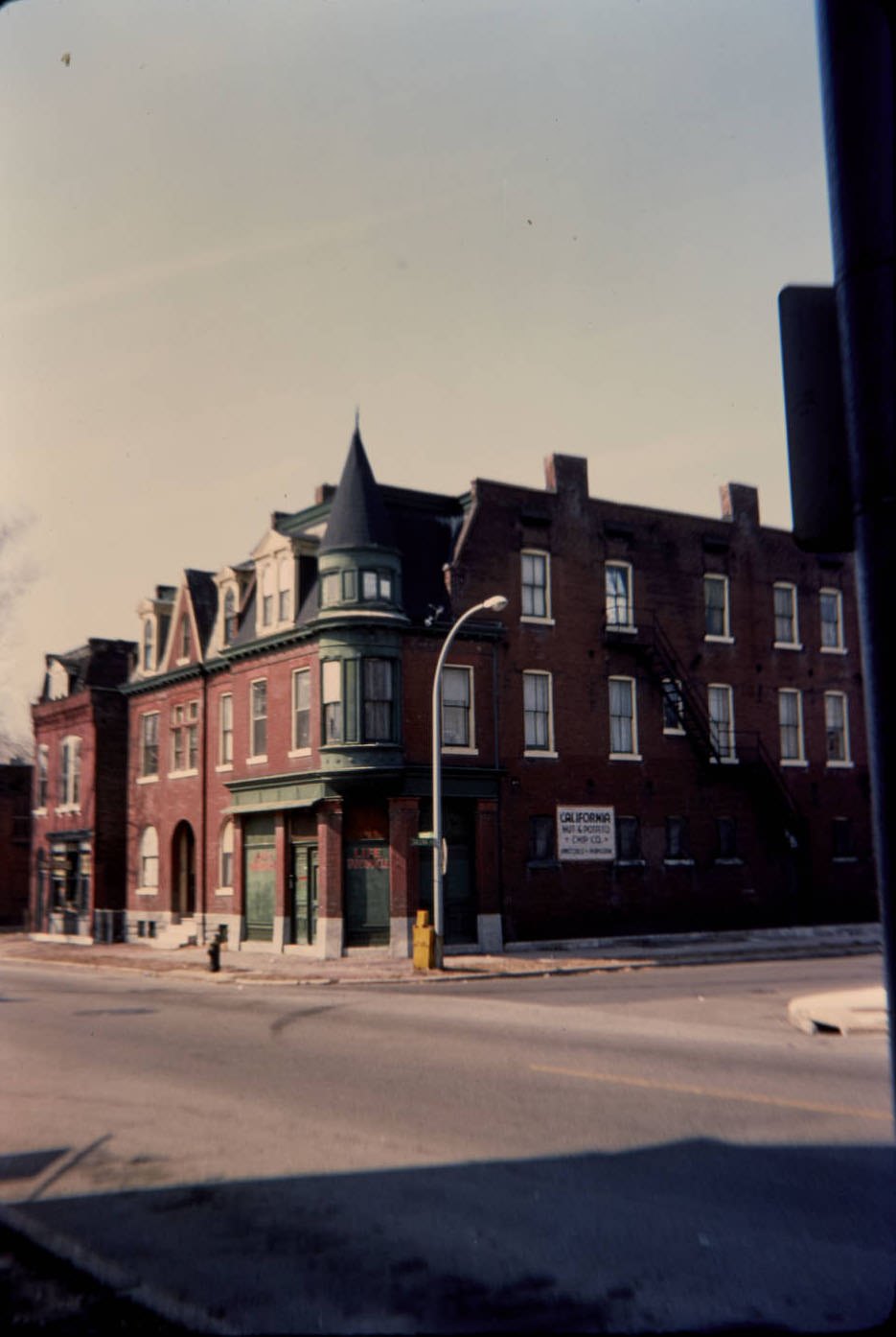 #106 Cherokee & Salena Sts. Commercial Corner, looking west, 1977