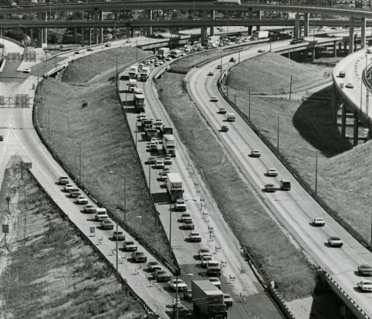 #73 Traffic of the Poplar Street Bridge on the East Side is bottle necked by barricades, 1977