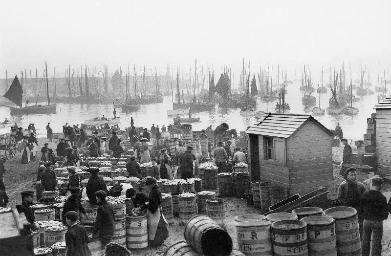 #17 A view of the boat-filled harbour and foresand showing the bustling activity connected with the fishing industry, St. Ives, Cornwall