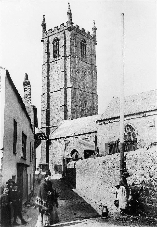 #21 A view of the Parish Church of St. Ia and its sturdy granite tower. To the left is the Star Inn (long since demolished), St. Ives, Cornwall