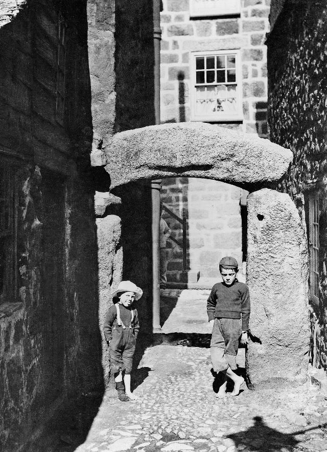 #28 A view of the well known granite arch that leads into Hicks Court from the Digey, St. Ives, Cornwall