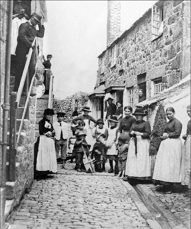 #40 Virgin Street, with the locals posed outside of their dwellings, St. Ives, Cornwall