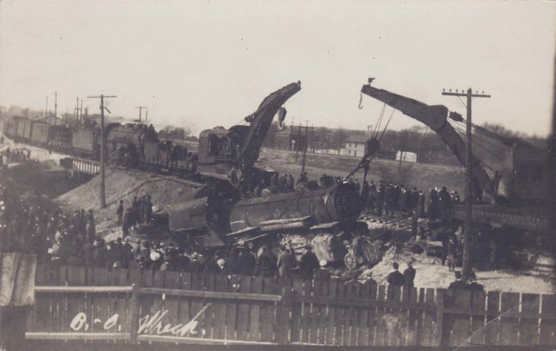 #3 B&O railroad engine lifted after tracks undermined, Massillon, Ohio, 1913