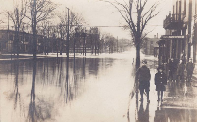 #24 Kids pose during flood, Liebermann’s bakery, Massillon, Ohio, 1913