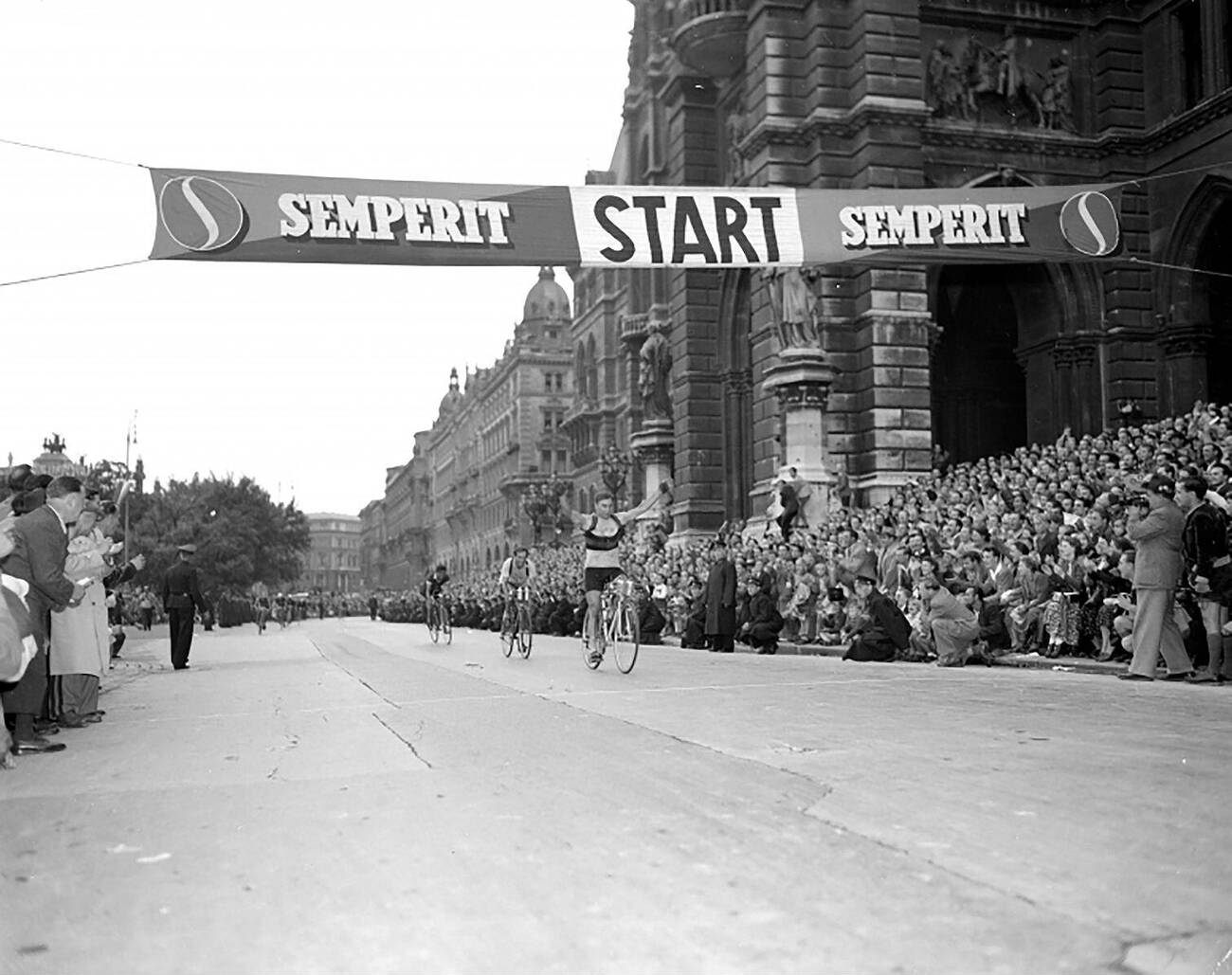 #41 The winner of the Tour of Austria 1950, Richard Menapace, at the finish at the Rathausplatz in Vienna, July 1950.