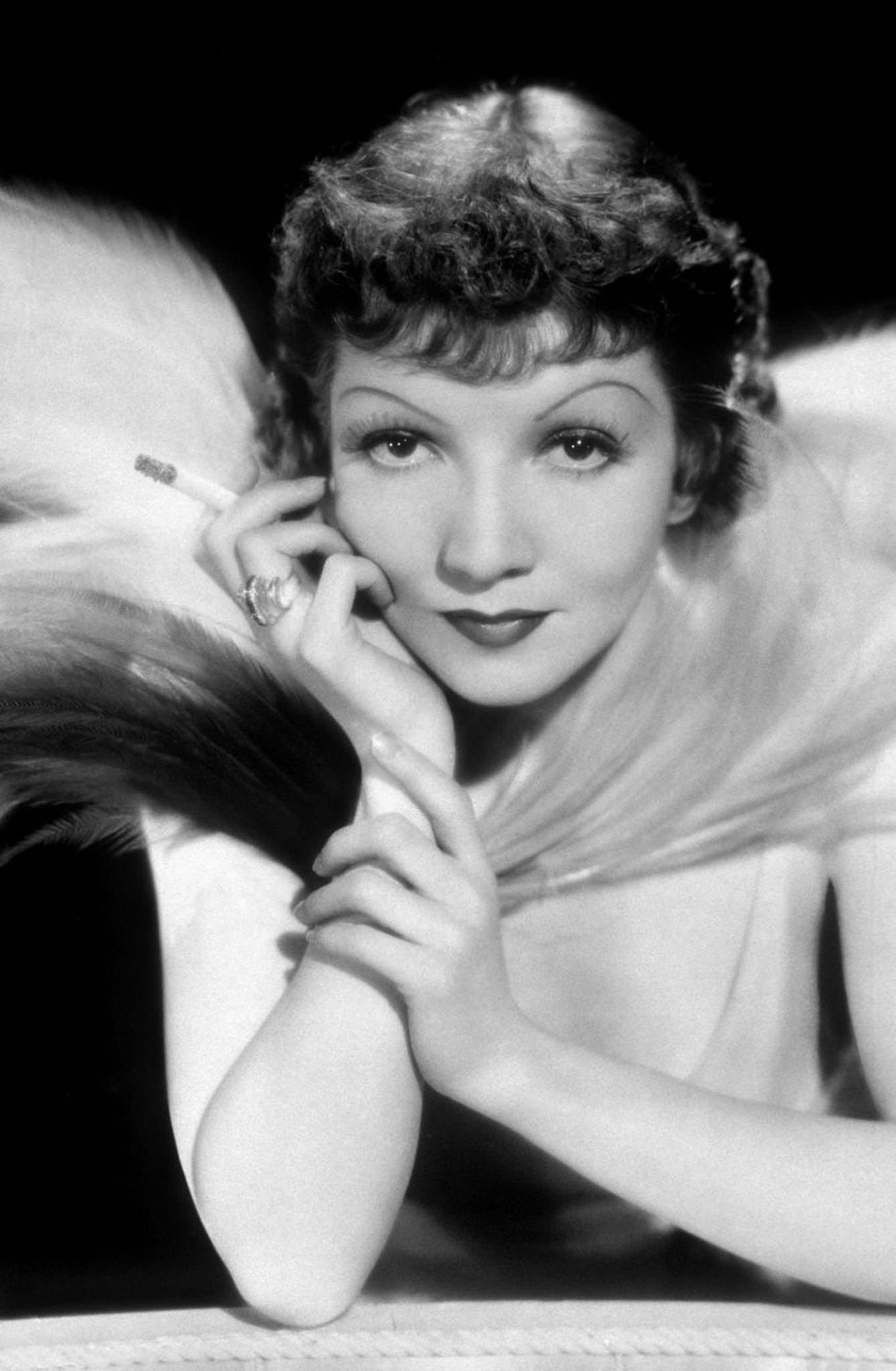 #2 American Actress Claudette Colbert, Radiant with a Cigarette