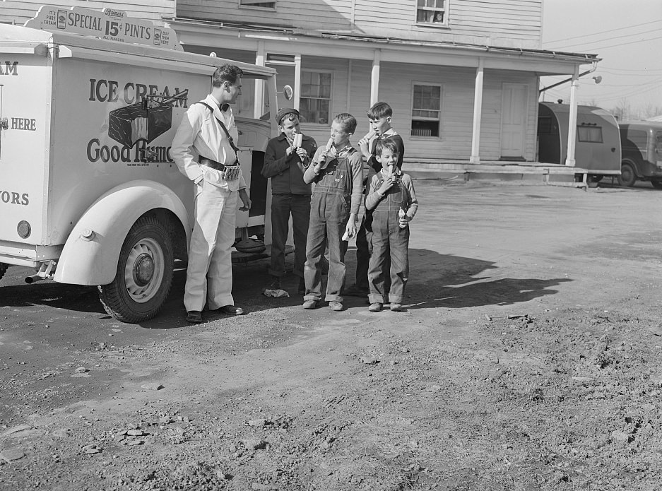 #4 Good Humor man comes to trailer camp on Saturday afternoon. These children are sons of torpedo plant workers in Alexandria, Virginia, 1941