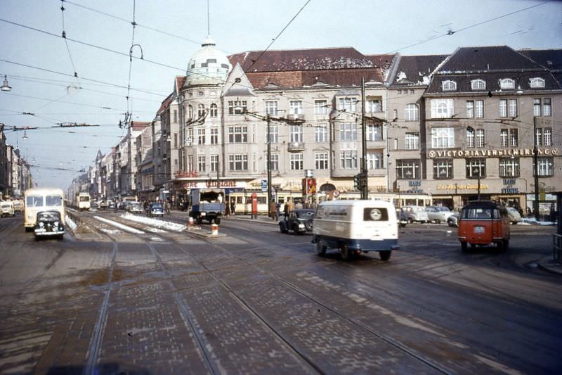 #41 The Steglitz Schlossstrasse shows tram and trolley coach (O-Bus) overhead, Berlin, 1954