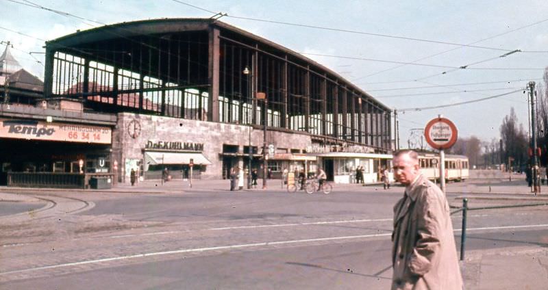 #46 Windowless Zoo Bahnhof with transit info center in front, Berlin, 1954