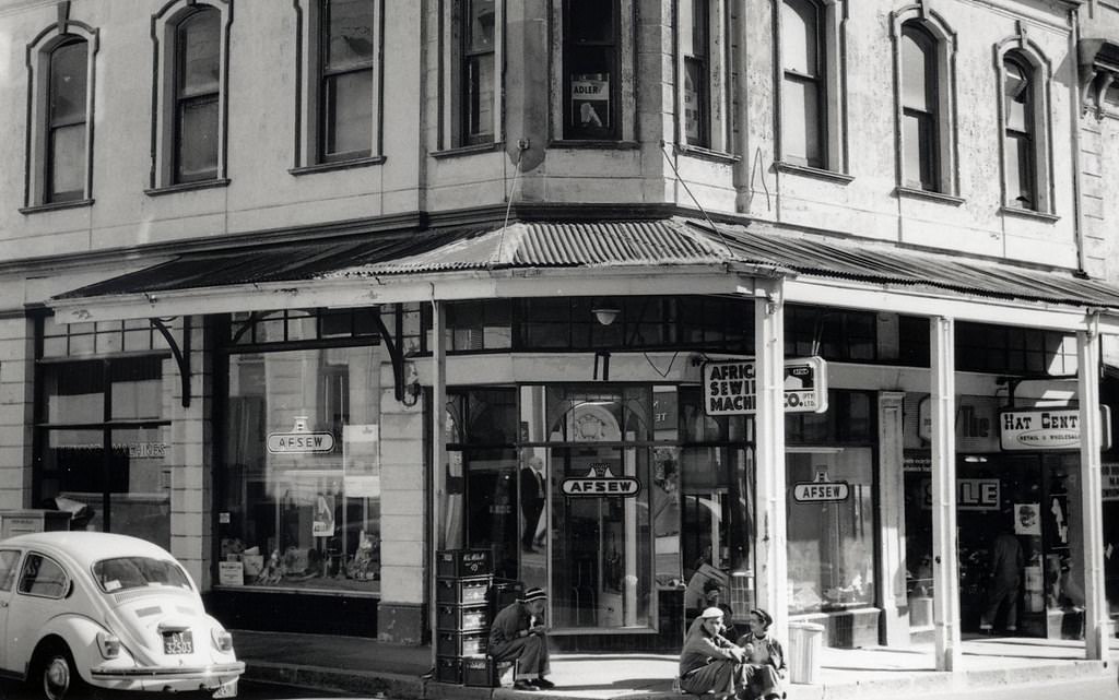 #89 The Plein street area. The Hat Centre is having a sale, 1971