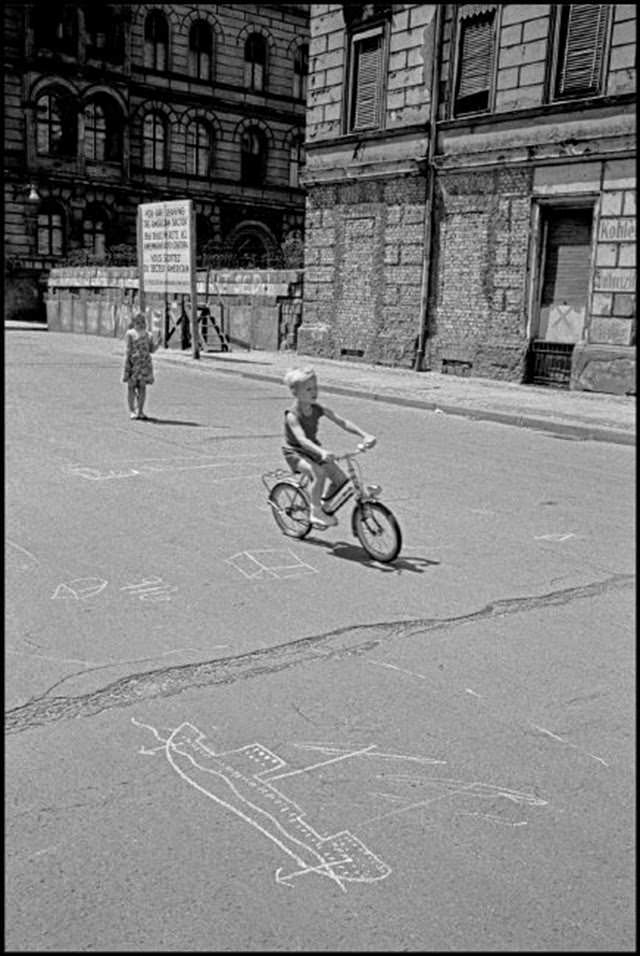 #21 Children playing at the Berlin Wall in Berlin Wedding.