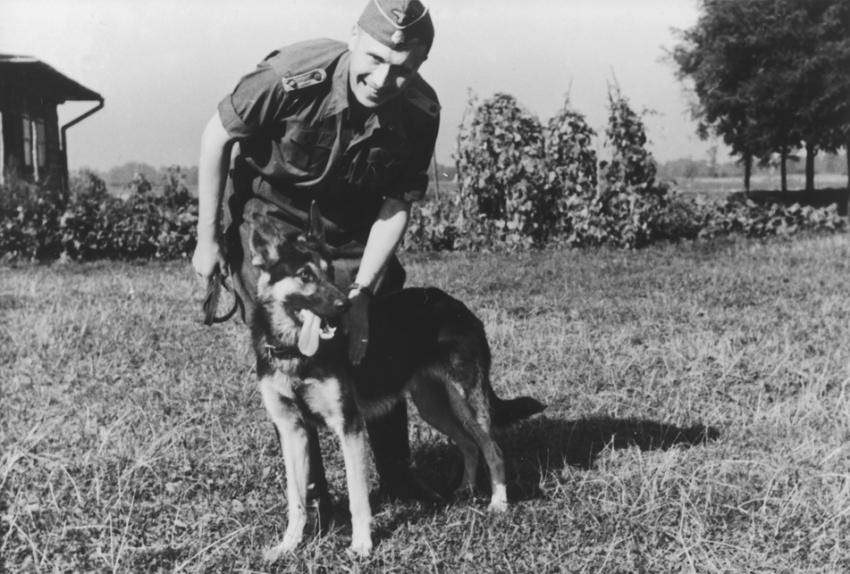 #15 SS officer Karl Höcker pets his dog “Favorit.”