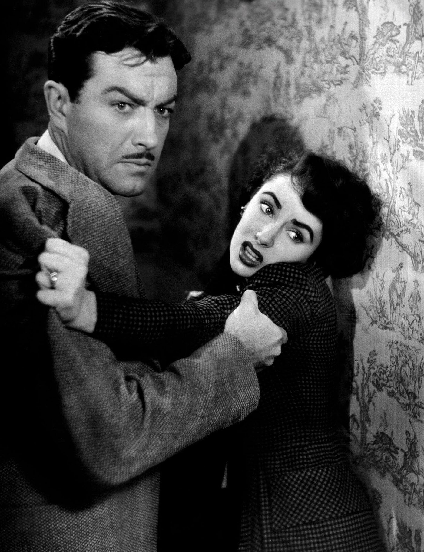 Elizabeth Taylor with Robert Taylor on the film set of ‘Conspirator’, 1949.