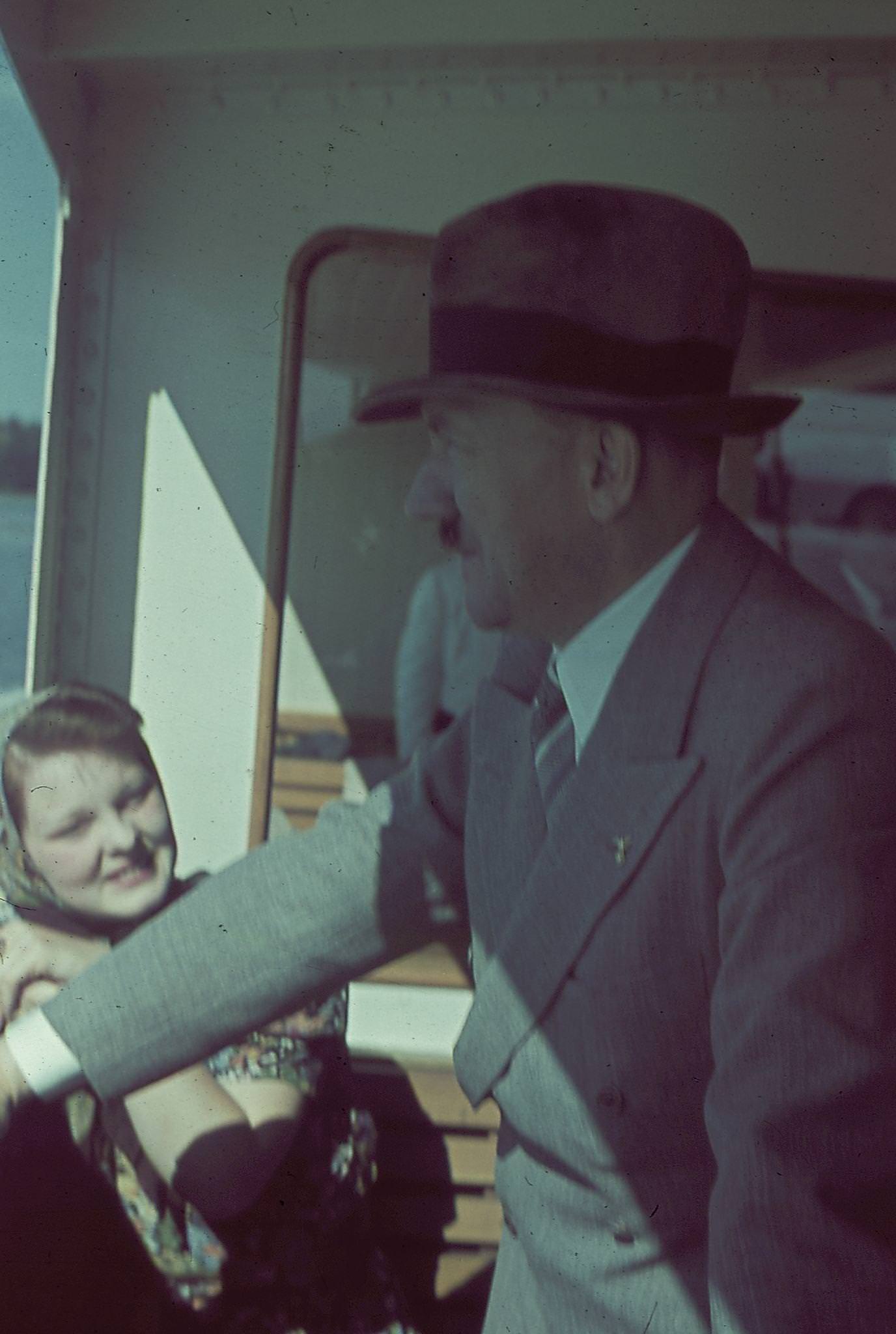 #6 Adolf Hitler on a boat trip with Geli Raubal, 1930