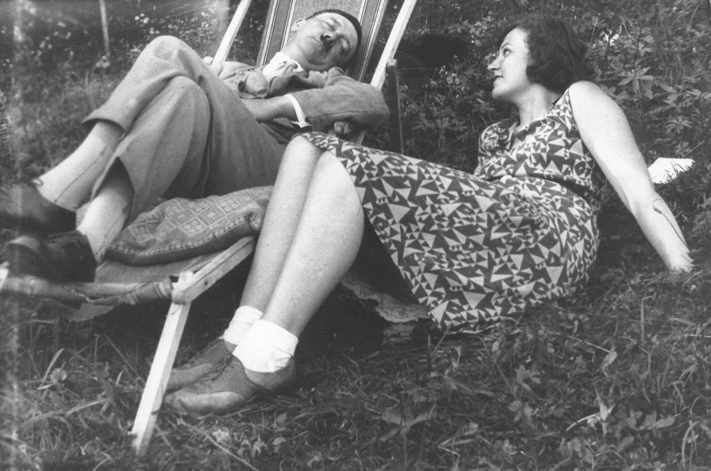 #7 Adolf Hitler (left) sitting next to his niece Angela (Geli) Raubal in a deck chair, 1930