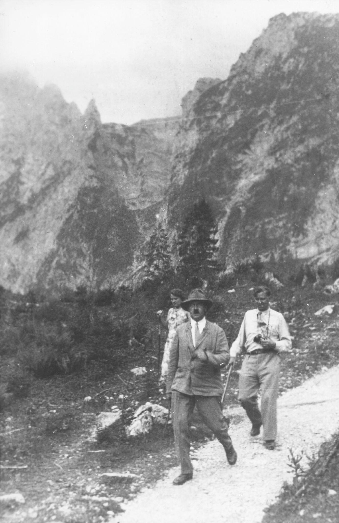 #8 Adolf Hitler with Julius Schaub and his niece Angela (Geli) Raubal on a stroll at Obersalzberg, 1930