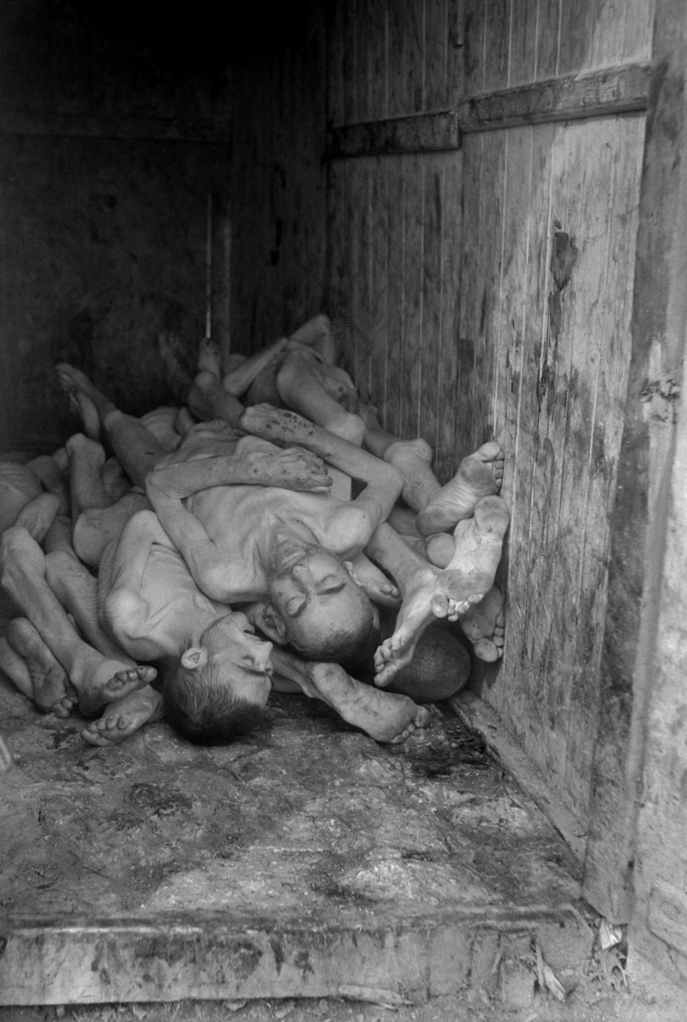 #19 Corpses of prisoners piled up at Buchenwald concentration camp upon its liberation by Allied troops in April 1945.