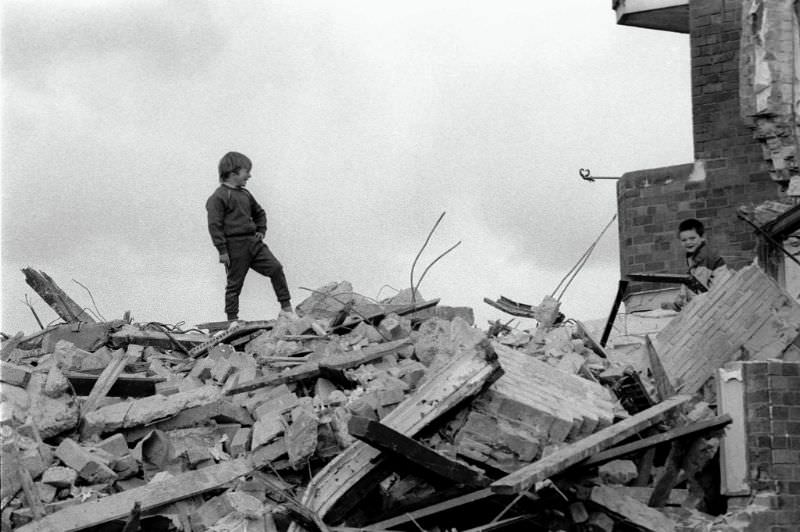 #137 Boys on rubble, 1980s