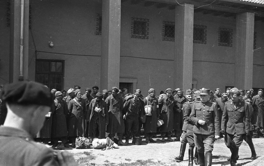 #4 Here it appears the camp inmates are preparing for their depature from Murnau.