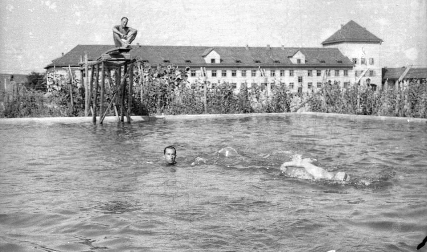 #8 Some photos, like this one of a swimming pool, almost give the impression that Oflag VII-A was a wellness retreat center, not a prisoner-of-war camp. But the photo does not reveal whether the camp’s prisoners were allowed to swim, or if it was permitted only for the guards.