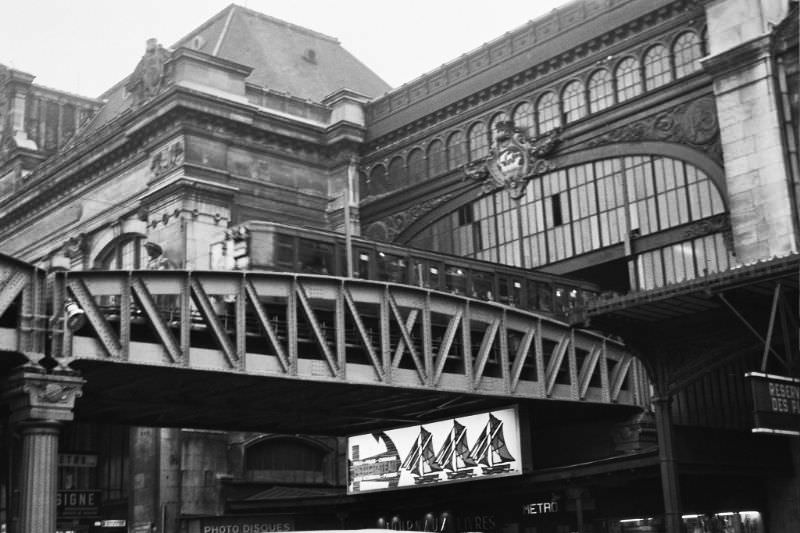 #23 Metro crosses the Seine and cuts through SNCF station, Paris, December 1969