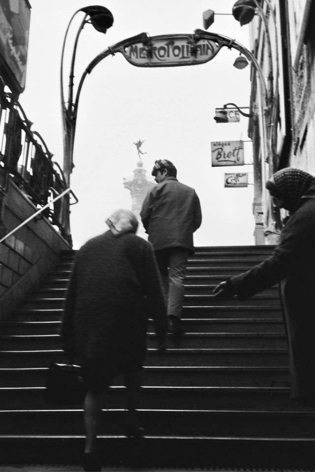 #39 Up the stairs from the Metro to Gare de la Bastille, soon to be closed, Paris, December 1969