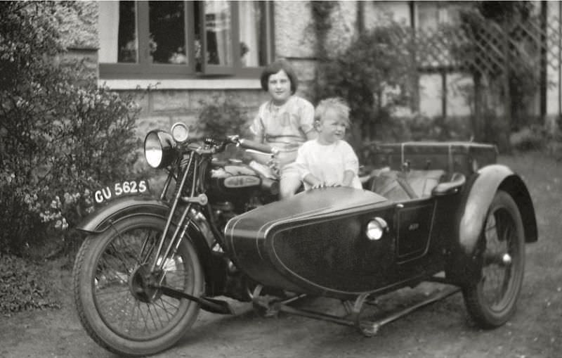 #13 AJS motorcycle and sidecar at Wroxham, Norfolk Broads, England, 1929