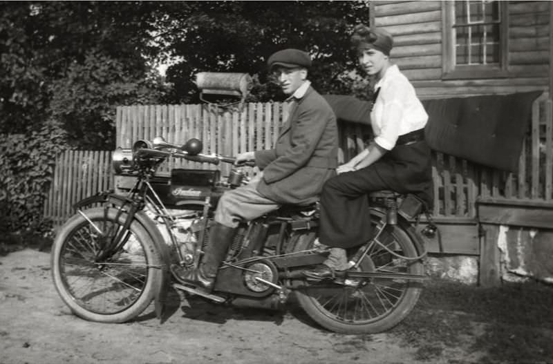#1 Two sitting on an Indian motorcycle, 1910s